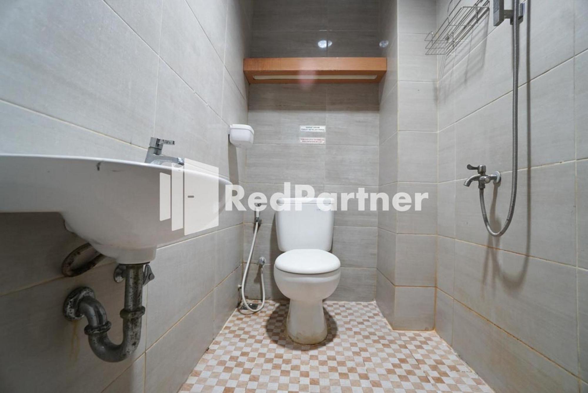 Eascot Hotel Mitra Reddoorz Jacarta Quarto foto