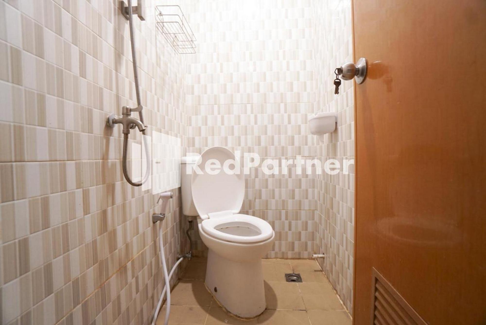 Eascot Hotel Mitra Reddoorz Jacarta Quarto foto