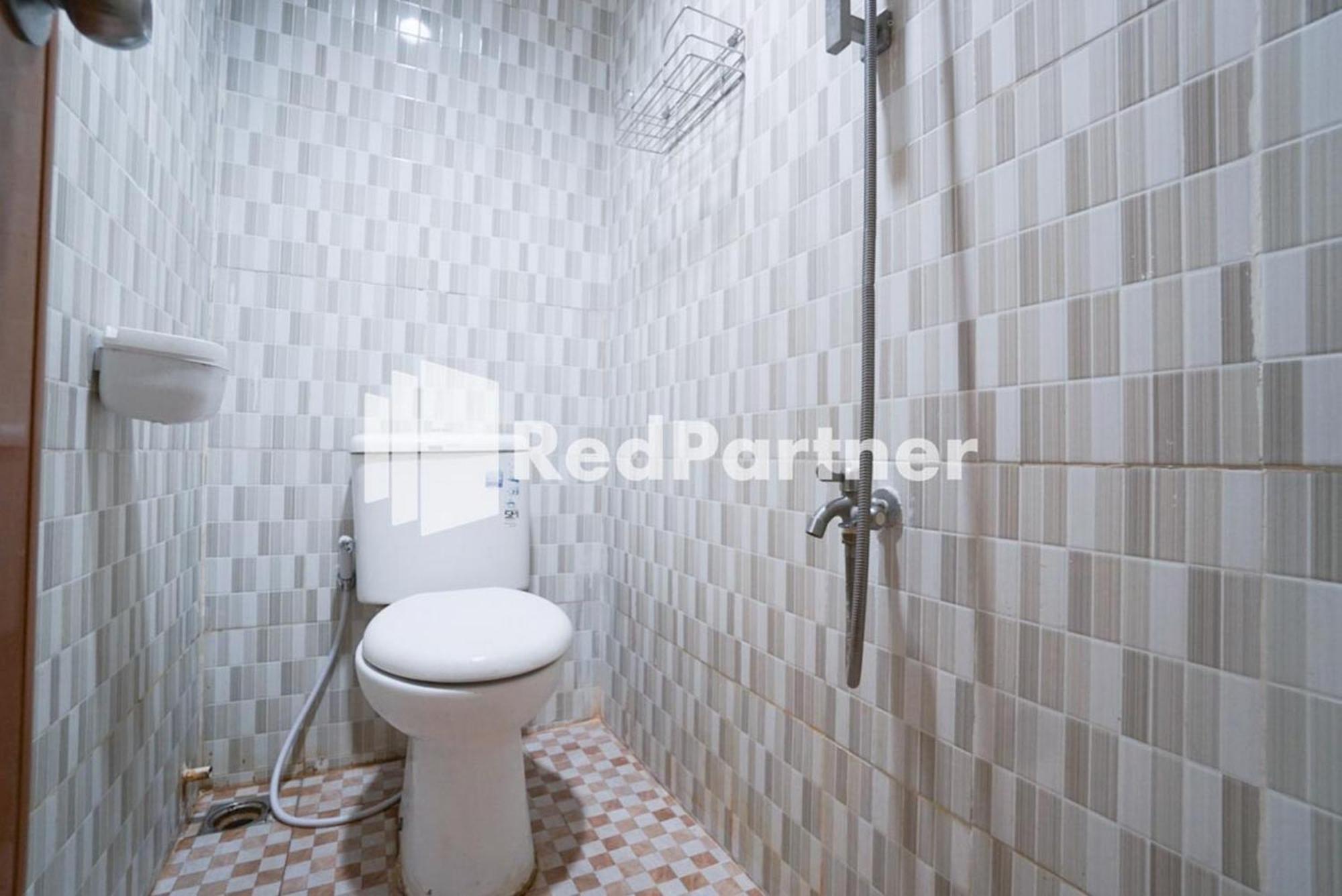 Eascot Hotel Mitra Reddoorz Jacarta Quarto foto